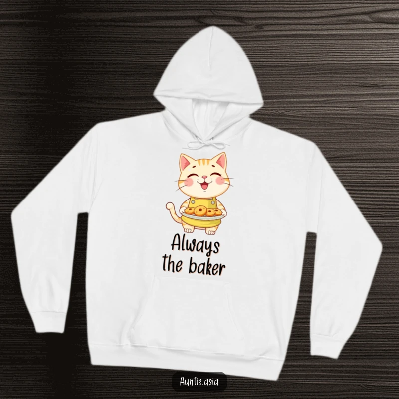 Funny cat in a bright apron, holding a plate of yummy cookies, a cozy and humorous hoodie for bakers and cat lovers.