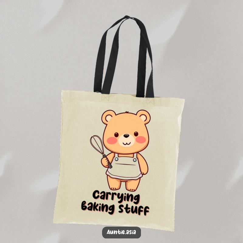 Funny bear in a small apron, holding a whisk and smiling, a humorous and functional tote bag.